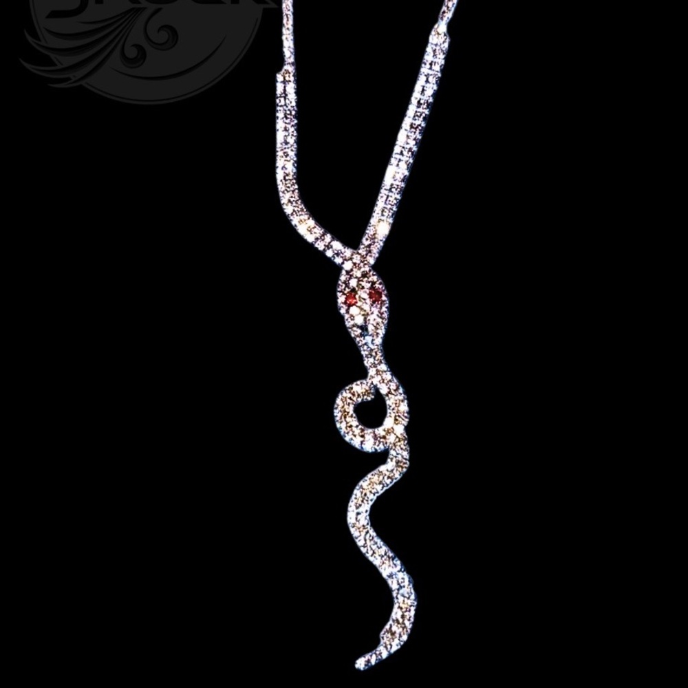Crystal Statement necklace. Stunning Silver snake with red  crystal eyes